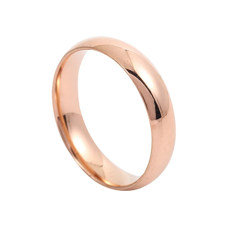 Anillo de acero inoxidable pulido en tonos dorado, rosa y negro
