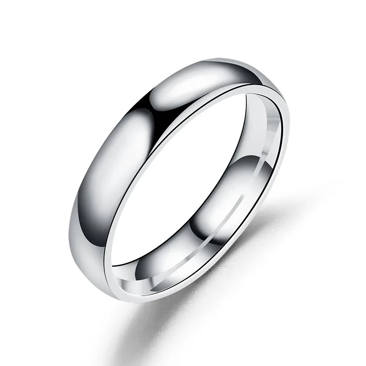 Anillo de acero inoxidable pulido en tonos dorado, rosa y negro